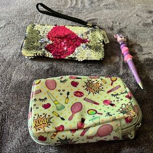 Sequin Heart Wristlet, muah cosmetic bag and Disney doorables  all priced as Set